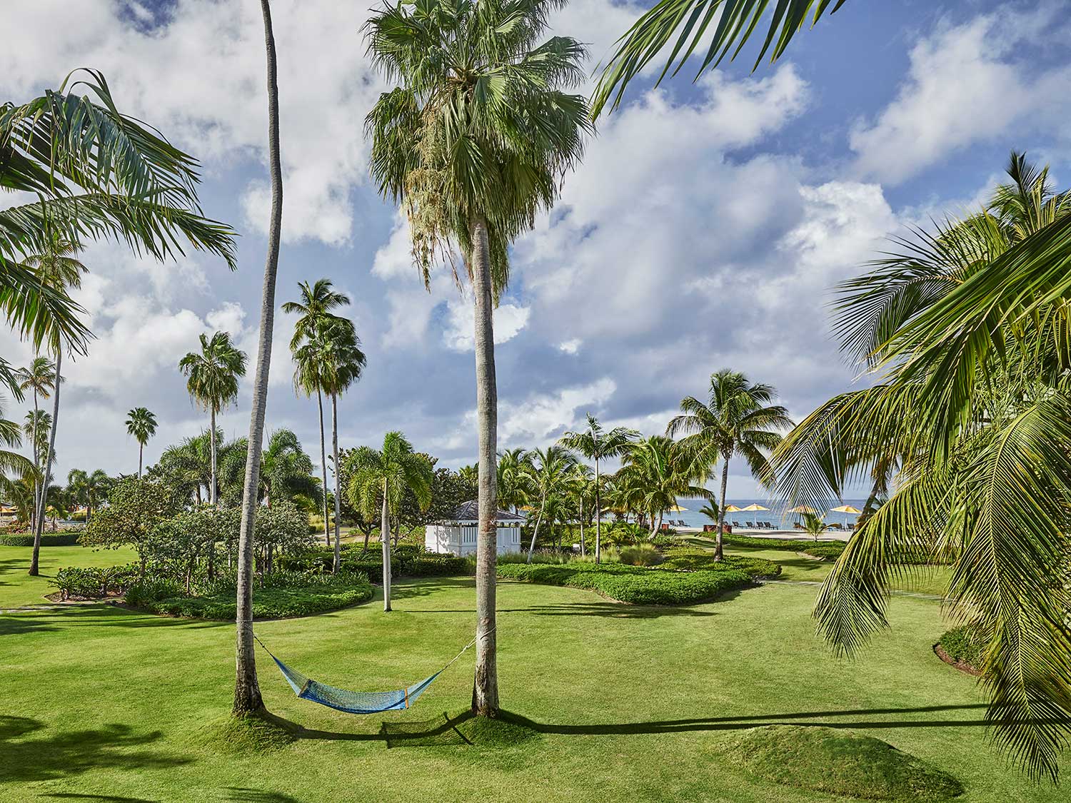 The sprawling green and palms of the Four Seasons resort.