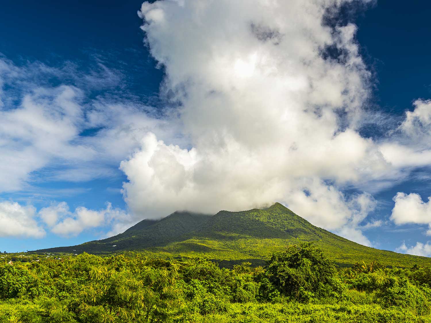 A view of the lush, green mountains of Nevis Peak.