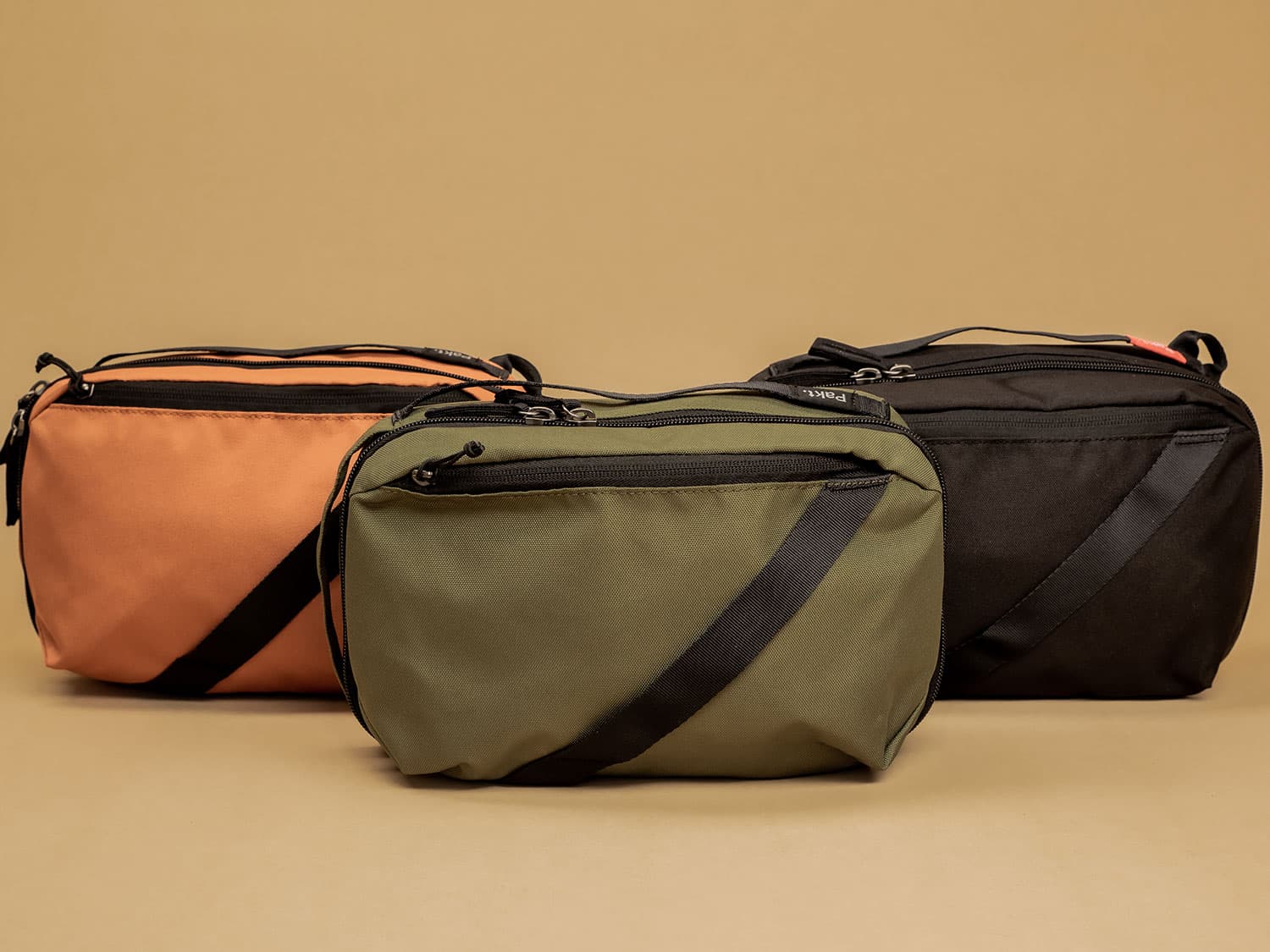 Three Pakt Anywhere collection sling bags.