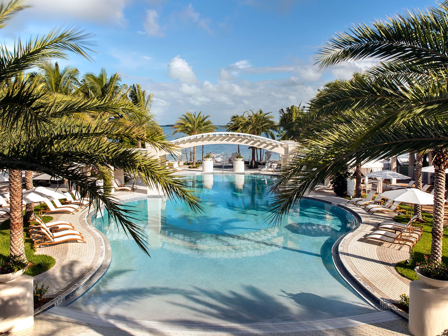An island beach resort poolside lounge area.
