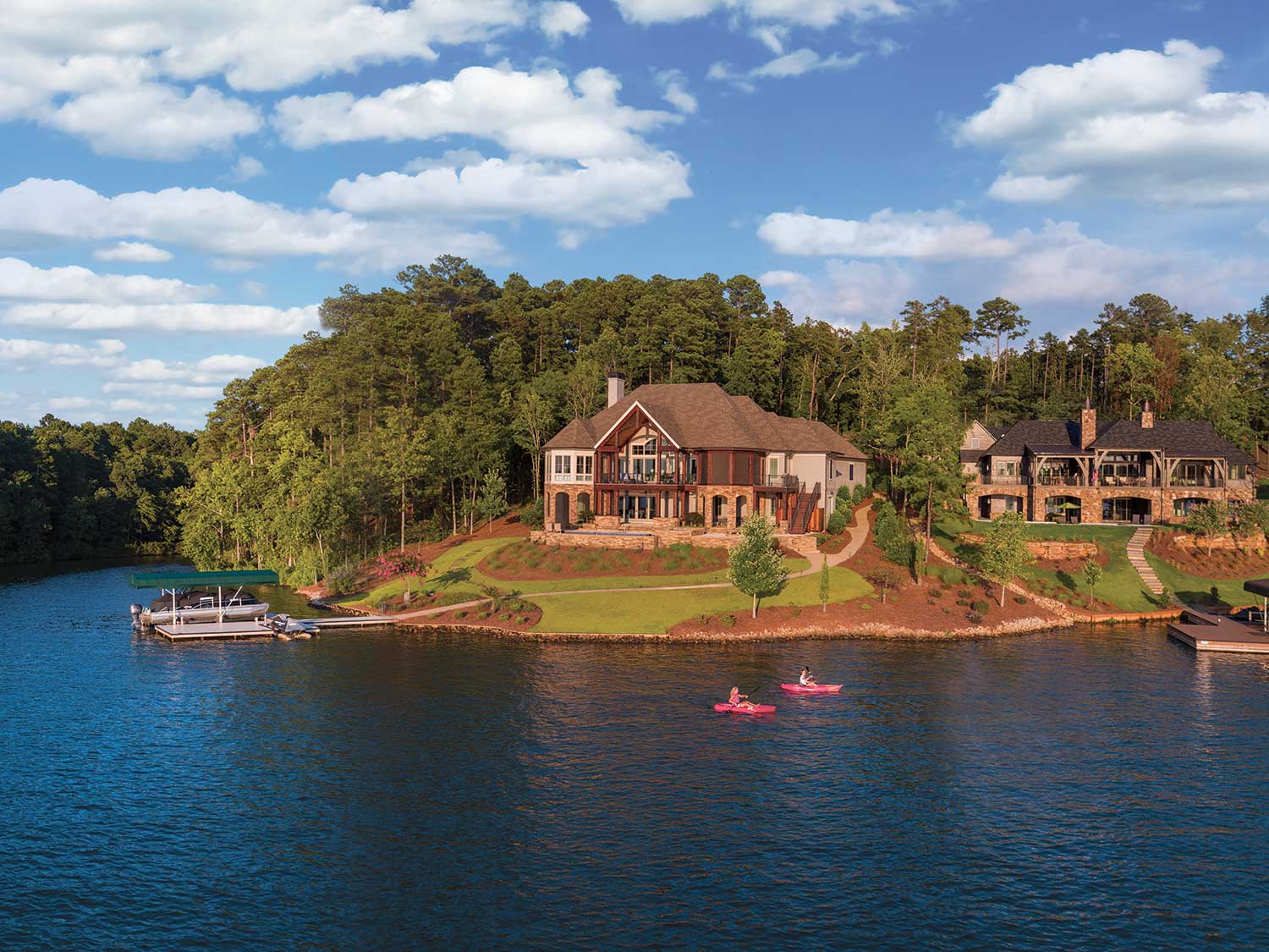 One of the many beautiful homes built by the water of Reynolds Lake Oconee.