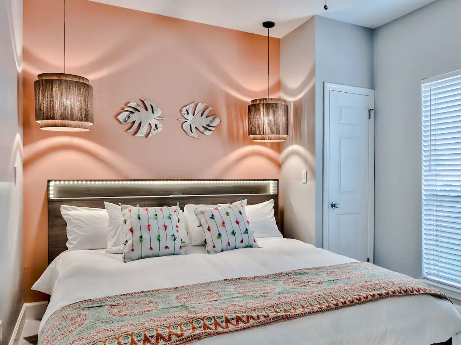 Bedroom with coral painted wall