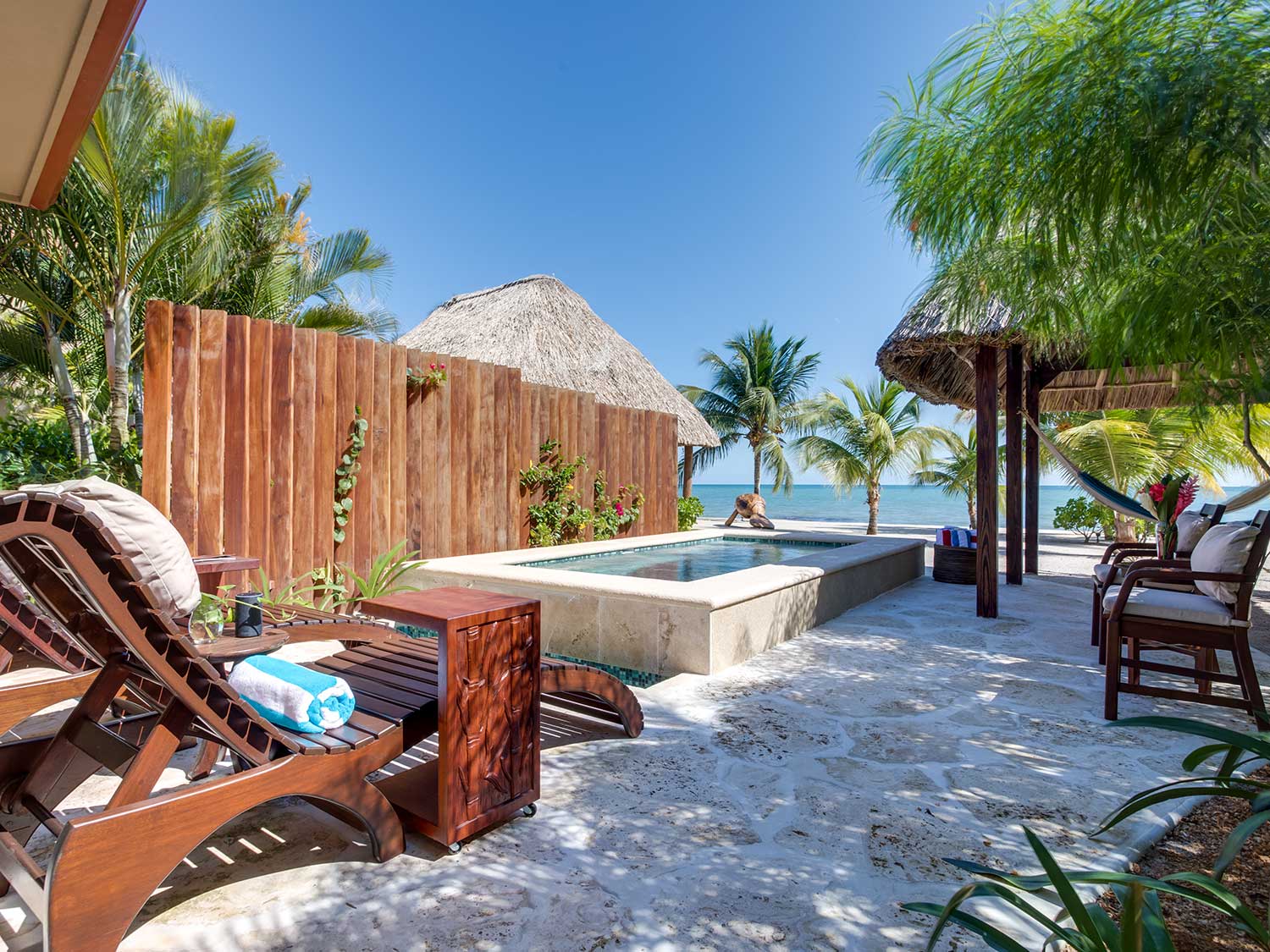 A small outside lounge area at a beach villa.