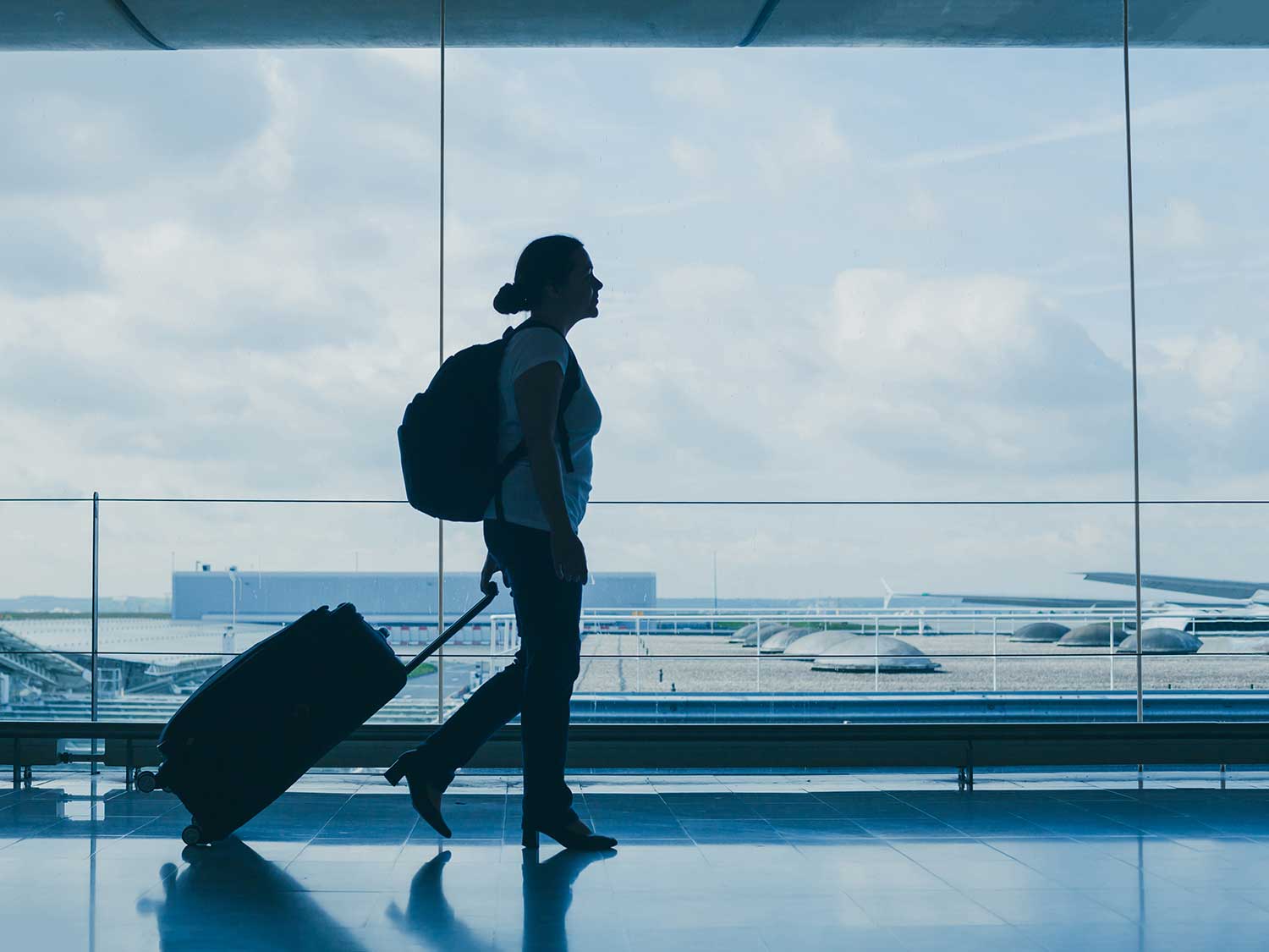 woman walking at airport