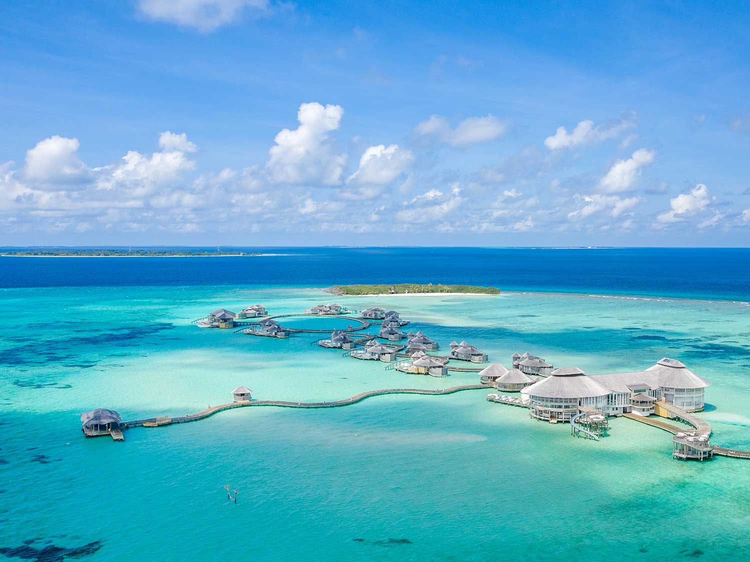 A large resort island surrounded by the ocean.