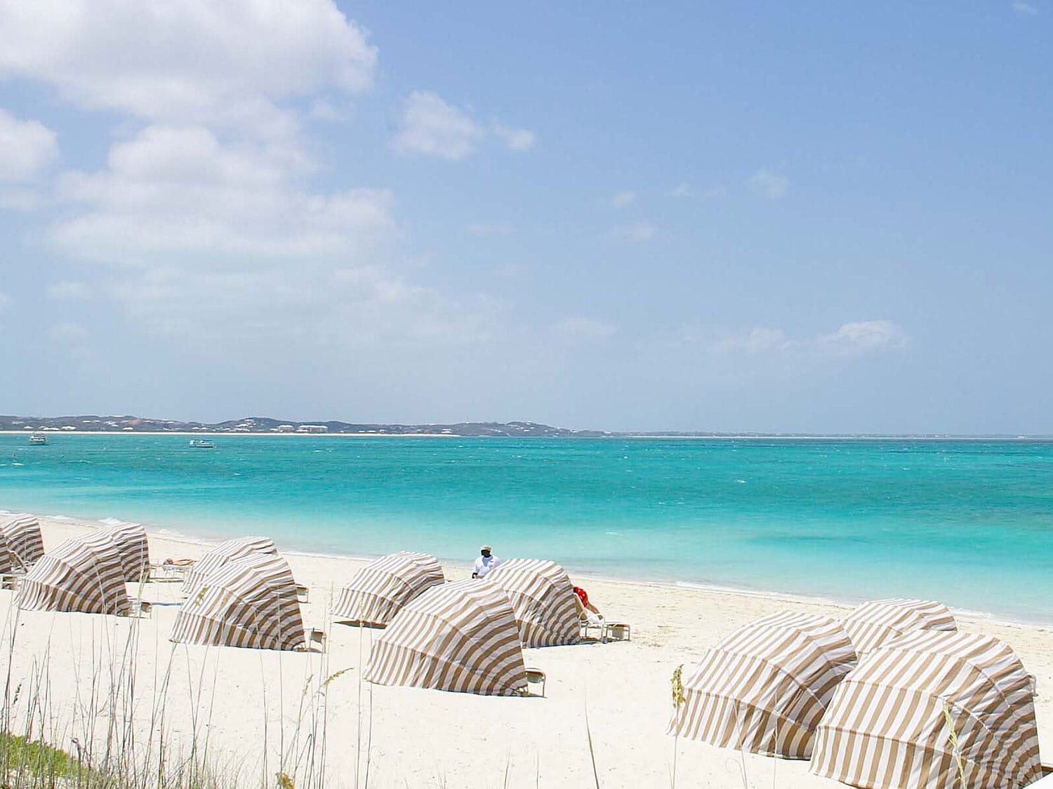 The palms grace bay beach with lounge seats.
