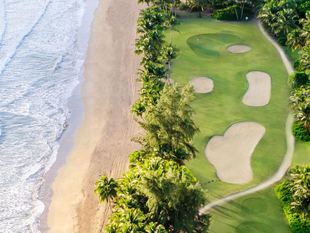 Aerial view of the Ocean Course golf course at the Wyndham Grand Rio Mar Puerto Rico resort.