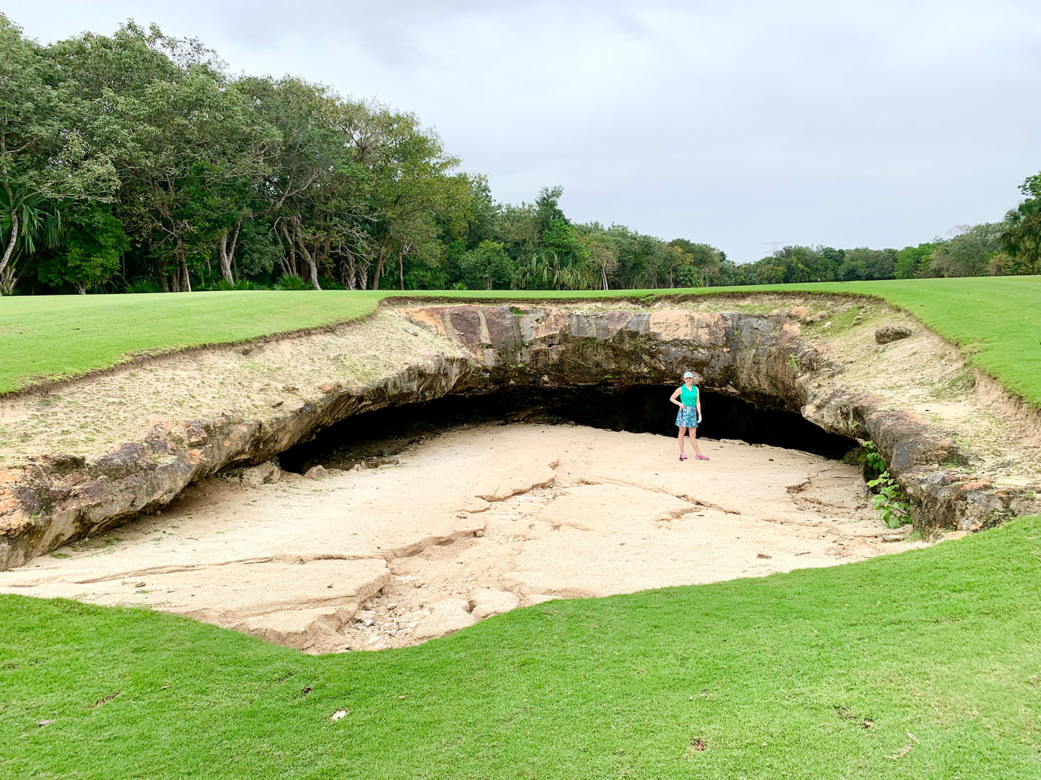 El Camaleon's iconic landmark is a cenote sand trap in the middle of the fairway on hole 7.