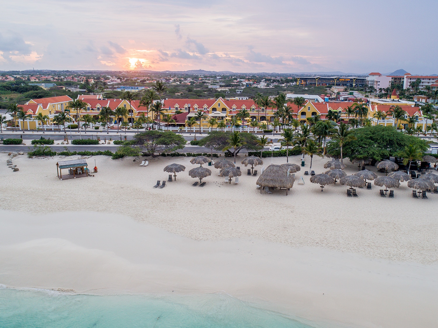 An aerial view of Amsterdam Manor Beach Resort on Eagle Beach in Aruba.