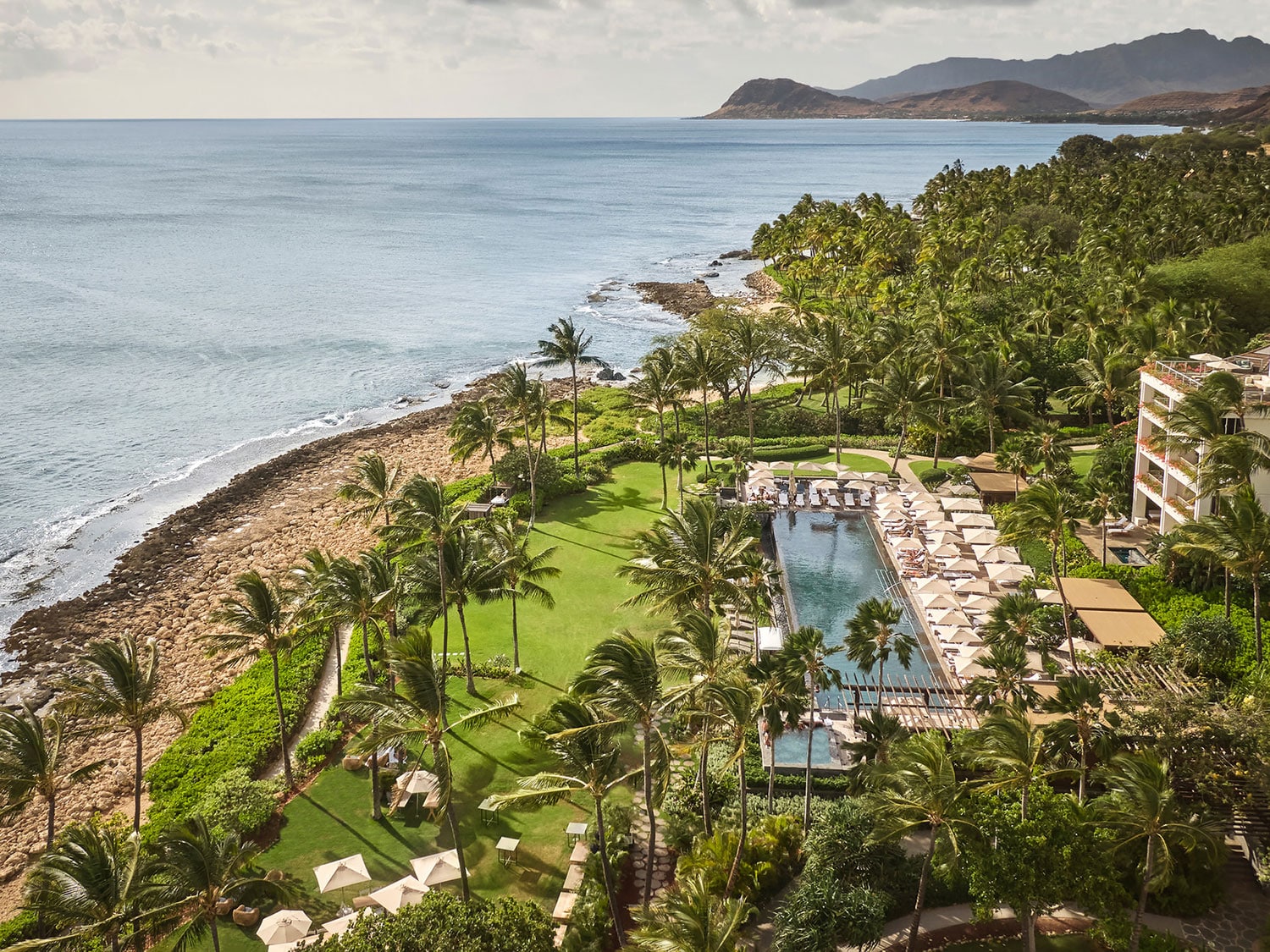 The Four Seasons Resort at Ko Olina features a variety of luxurious amenities creatively blended with the surrounding natural beauty.