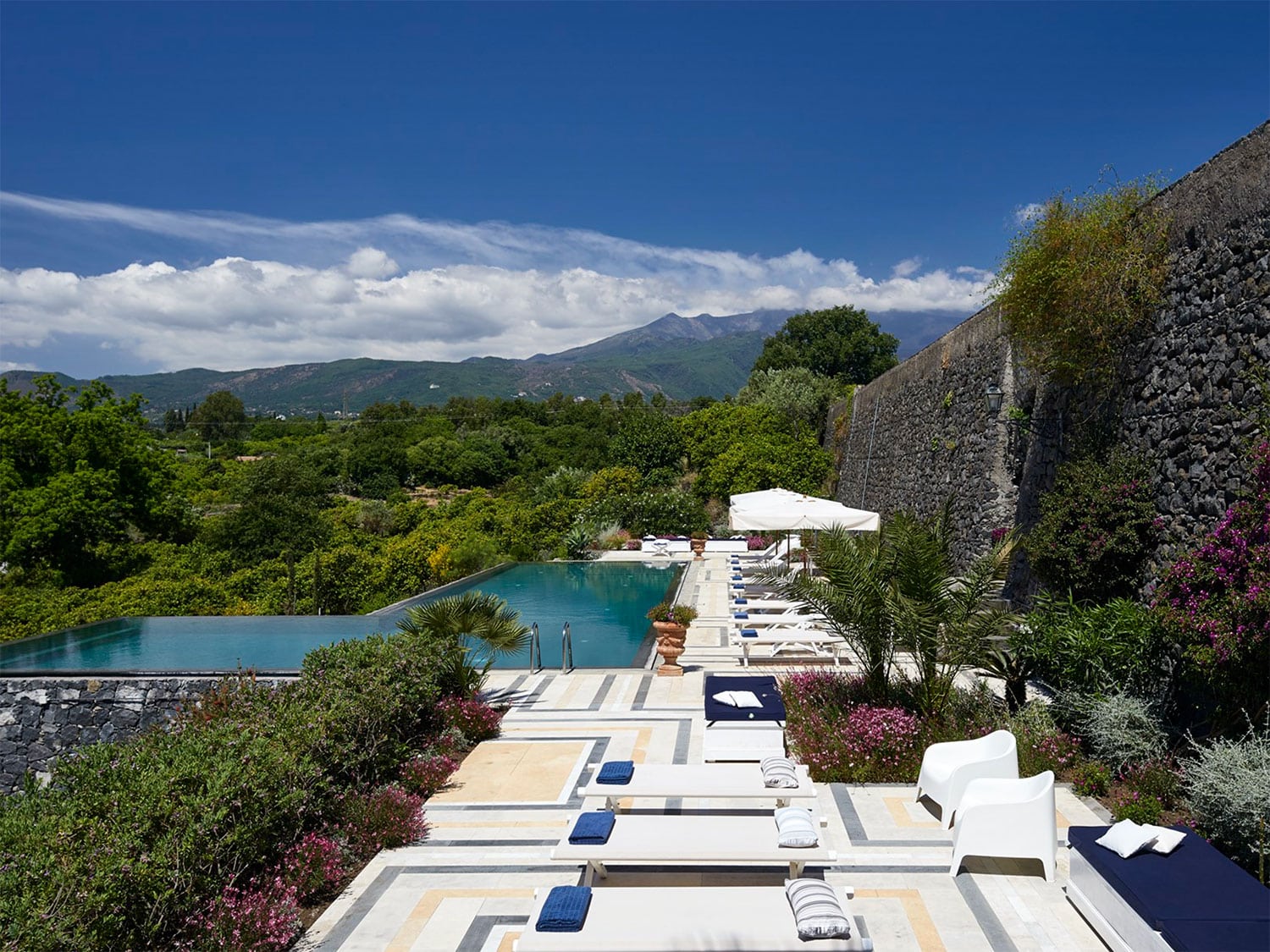The private pool at Rocca delle Tre Contrade, a luxurious 12-bedroom villa located in Taormina, Sicily, Italy.