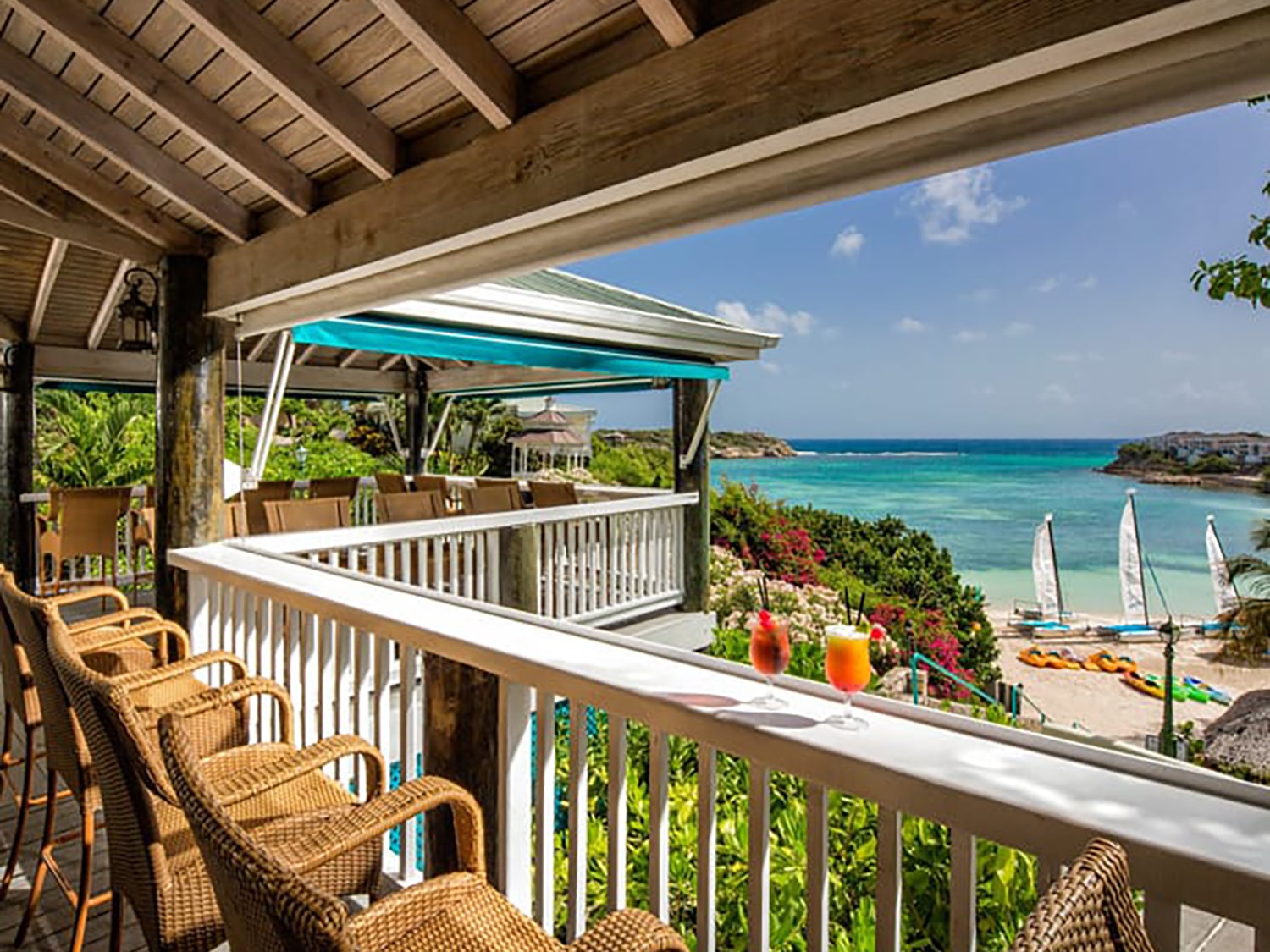The Beach Bar at Verandah Resort and Spa offers incredible views of the island, paired with delicious signature cocktails.