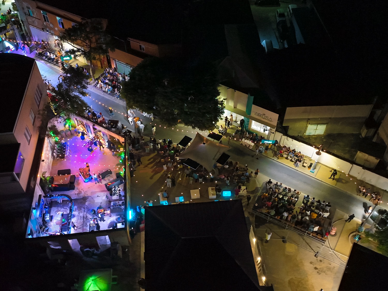 An aerial drone view of downtown San Nicolas, Aruba, on the first night of the 2022 Aruba Art Festival and Fusion Pop-up Restaurant.