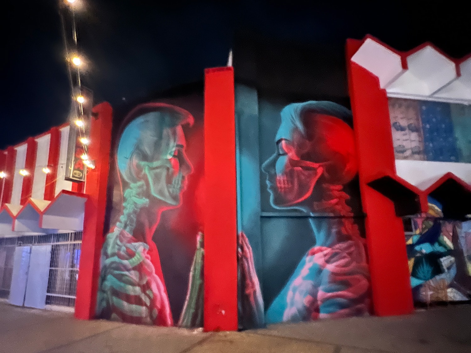 An x-ray mural on the side of a building in downtown San Nicolas, Aruba, on the first night of the 2022 Aruba Art Festival and Fusion Pop-up Restaurant.