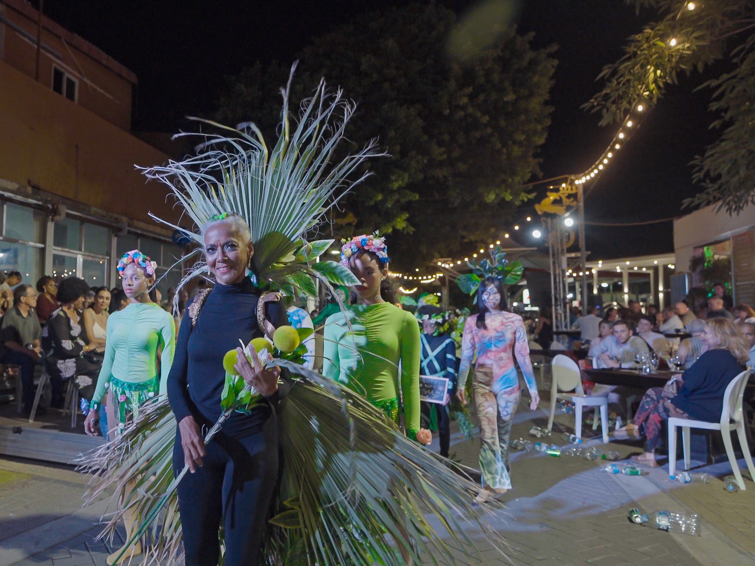Performers are applauded in downtown San Nicolas, Aruba, during the 2022 Aruba Art Festival and Fusion Pop-up Restaurant.