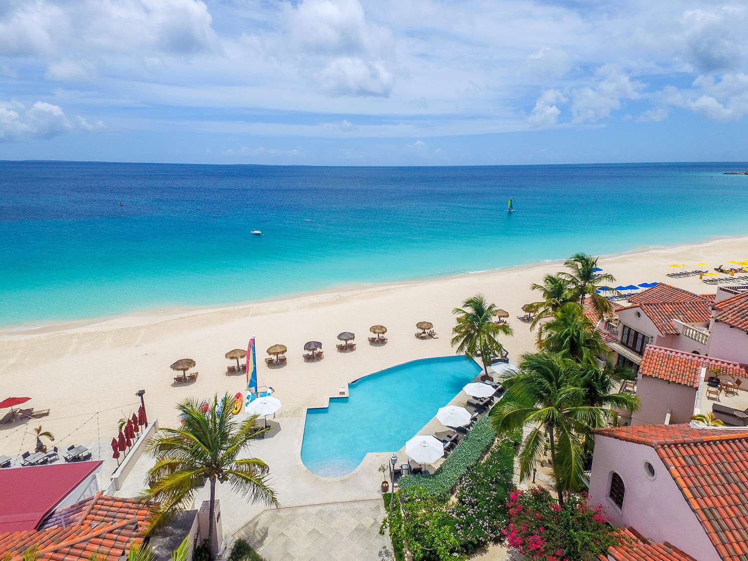 An aerial view of the pool and beach at Frangipani Beach Resort, located on Meads Bay in Anguilla.