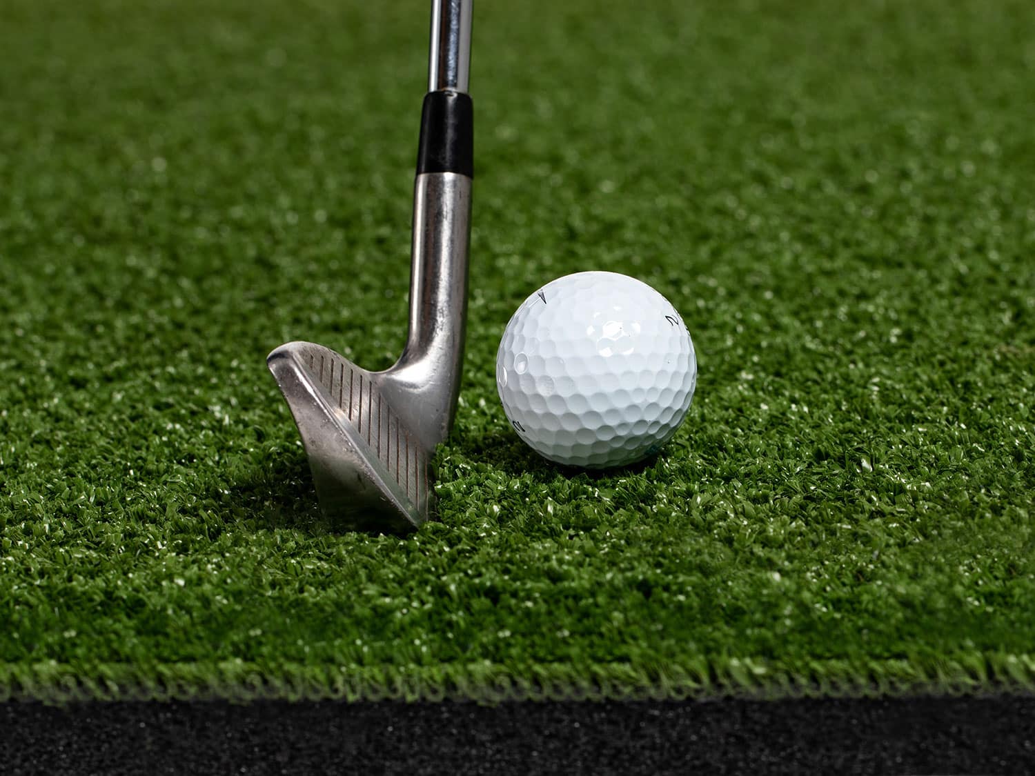 An up-close look at the Monster Mat golf practice aid.