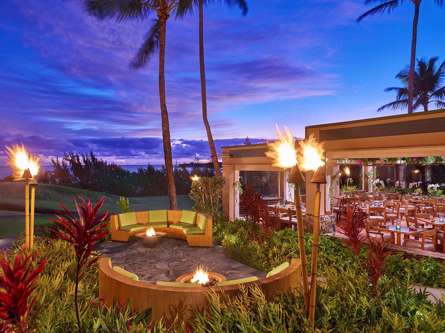 The outdoor seating area at The Banyan Tree restaurant at The Ritz-Carlton Maui, Kapalua, in Hawaii.