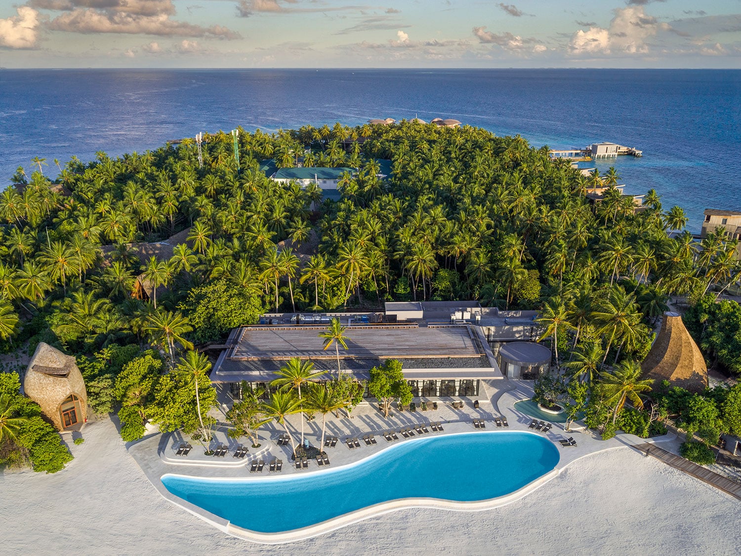 An aerial view of the pool and Alba restaurant at The St. Regis Maldives Vommuli Resort.