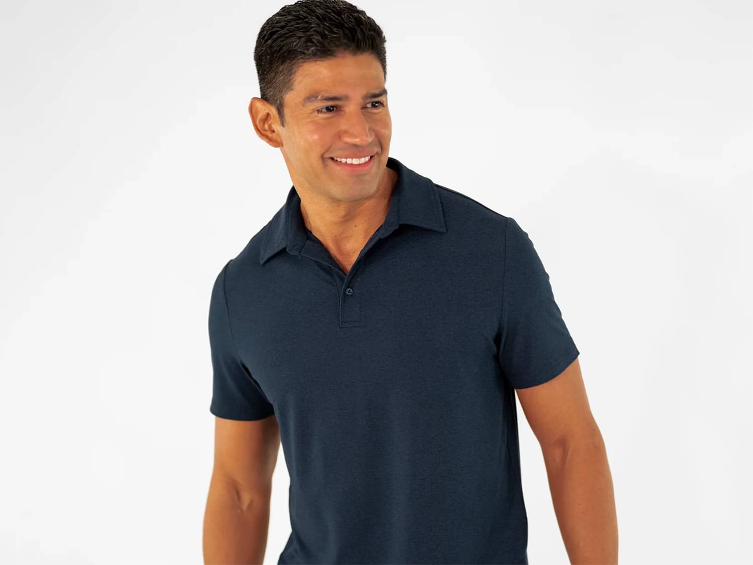 A man wearing a Bearbottom Clothing Tech Polo.
