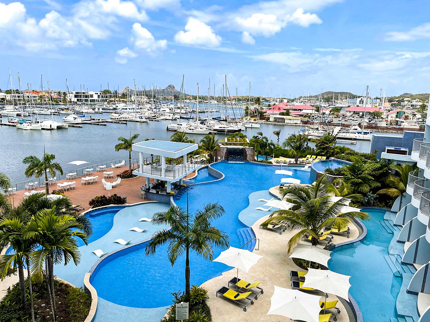 An aerial view of the pool and marina at Harbor Club in the Caribbean island of St. Lucia.