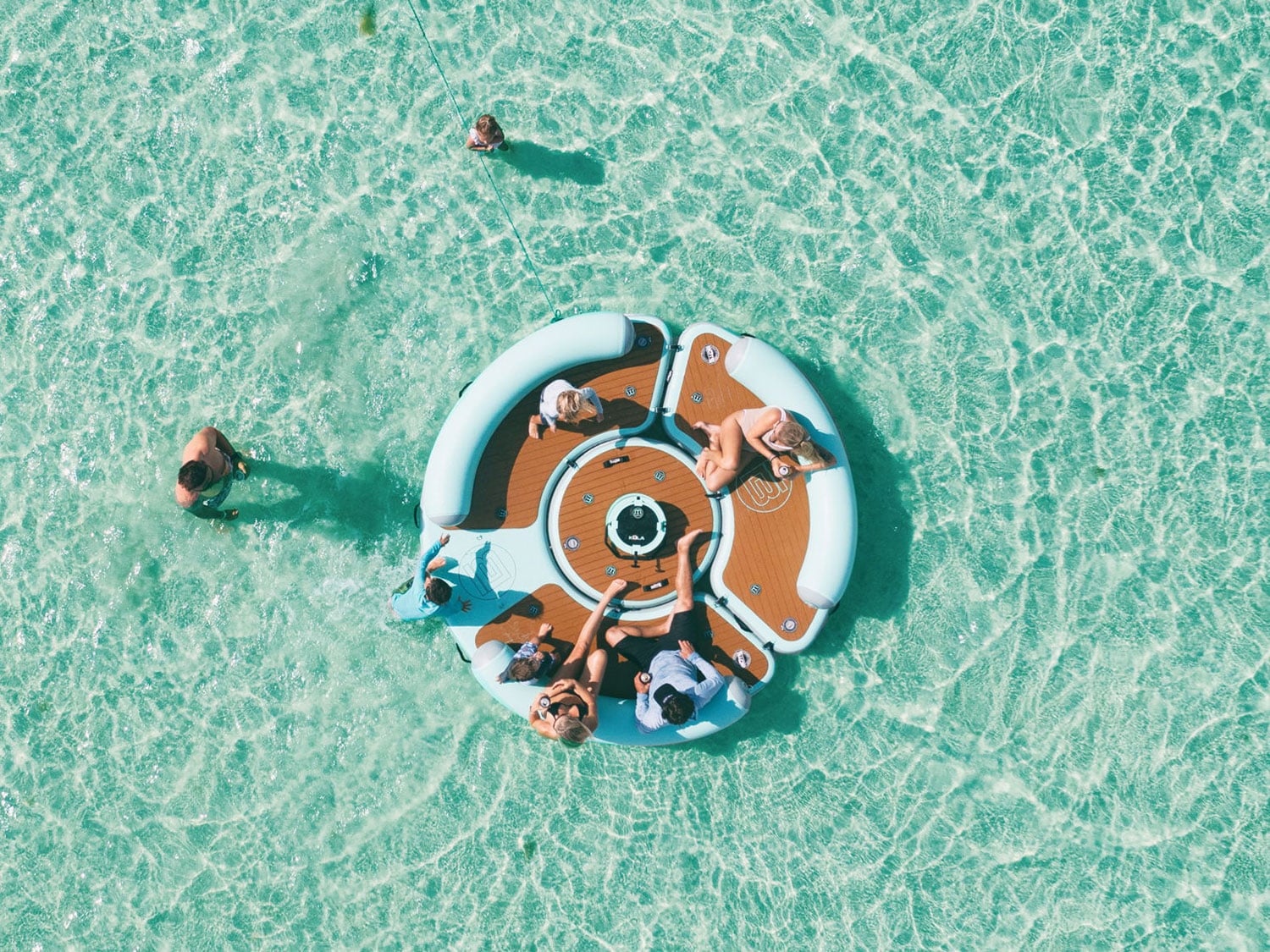 An aerial view of the Bote Hangout Suite in blue water.