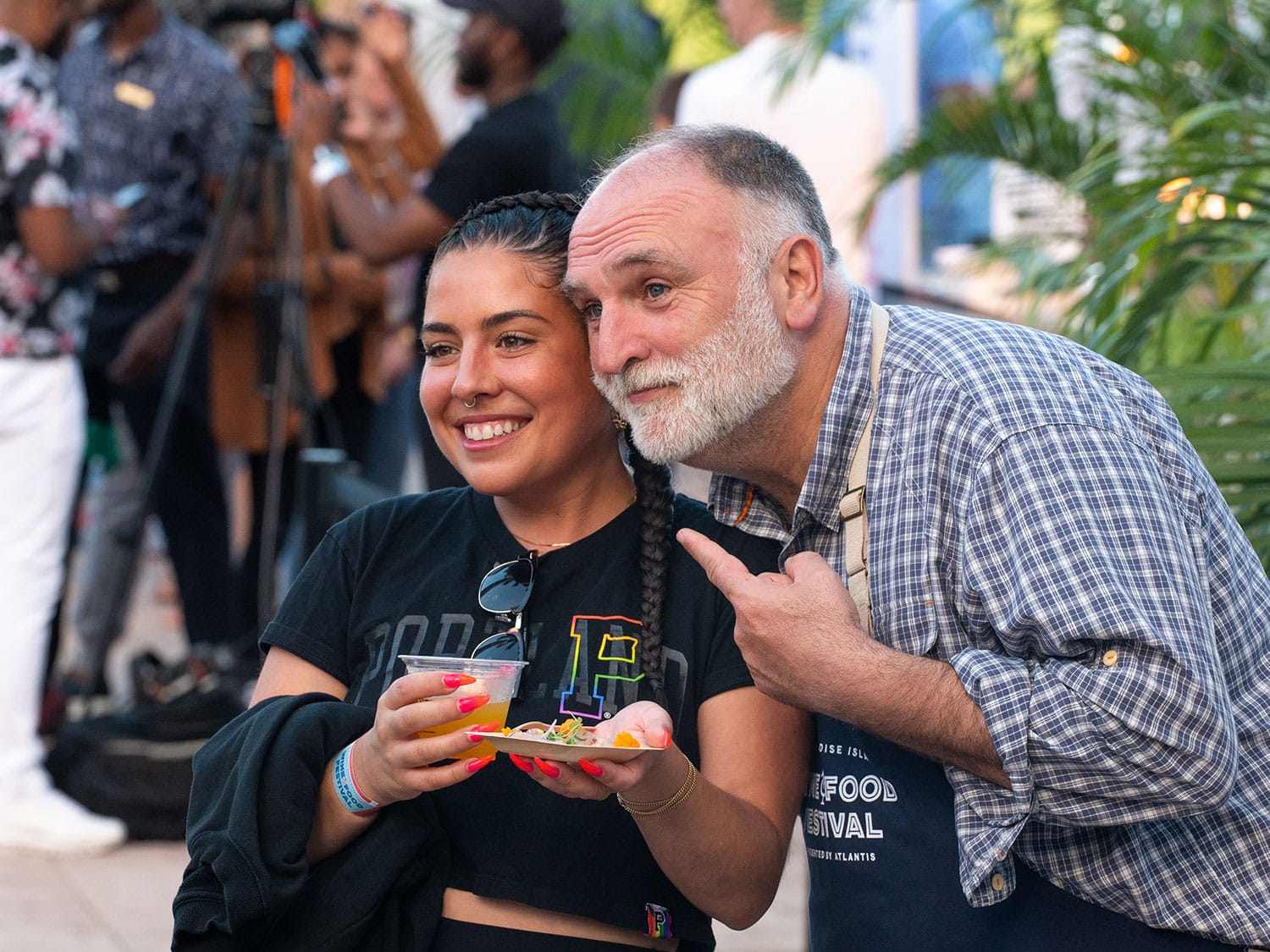Chef and humanitarian José Andrés poses for a photograph with a guest at the Nassau Paradise Island Wine and Food Festival at Atlantis Paradise Island.