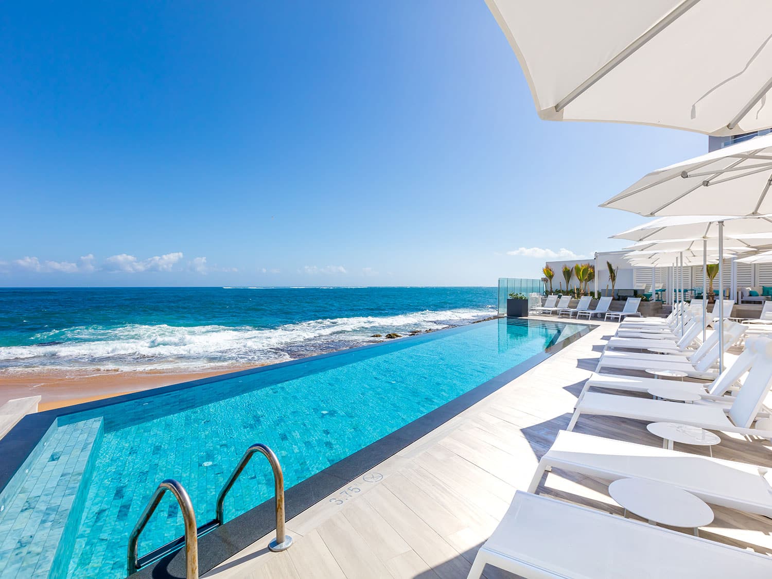 The pool and loungers at the Condado Ocean Club resort in Puerto Rico.