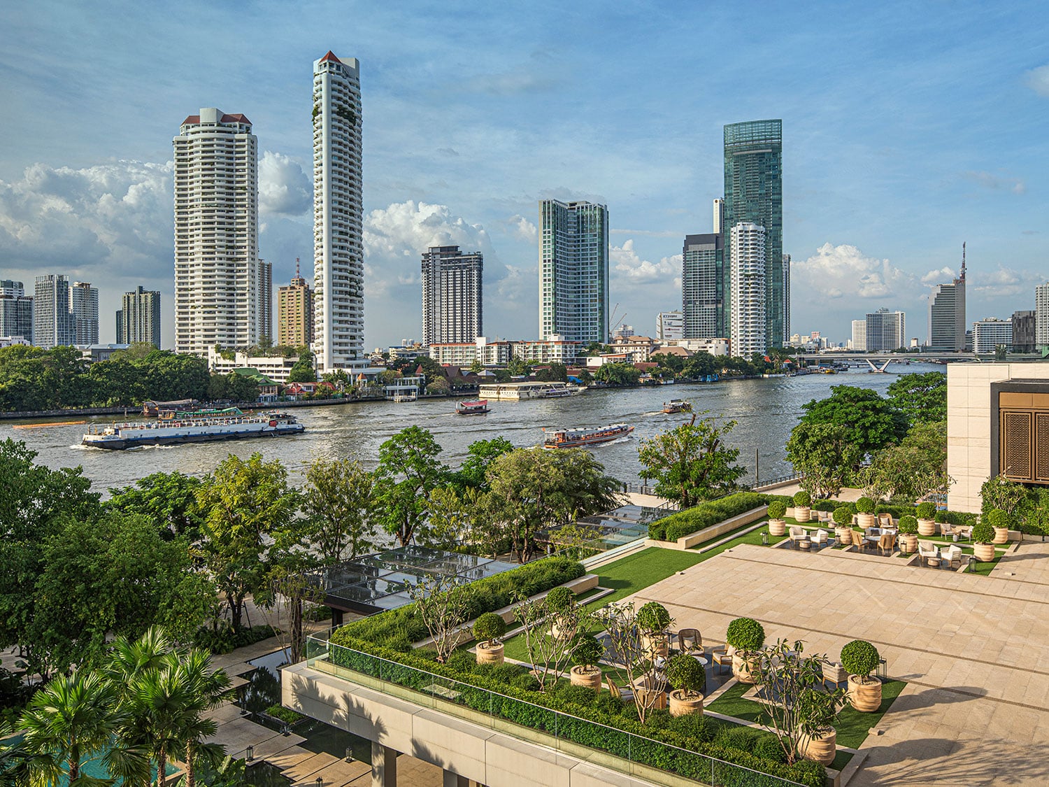 A view of the city and river from Four Seasons Hotel Bangkok at Chao Phraya River in Thailand.