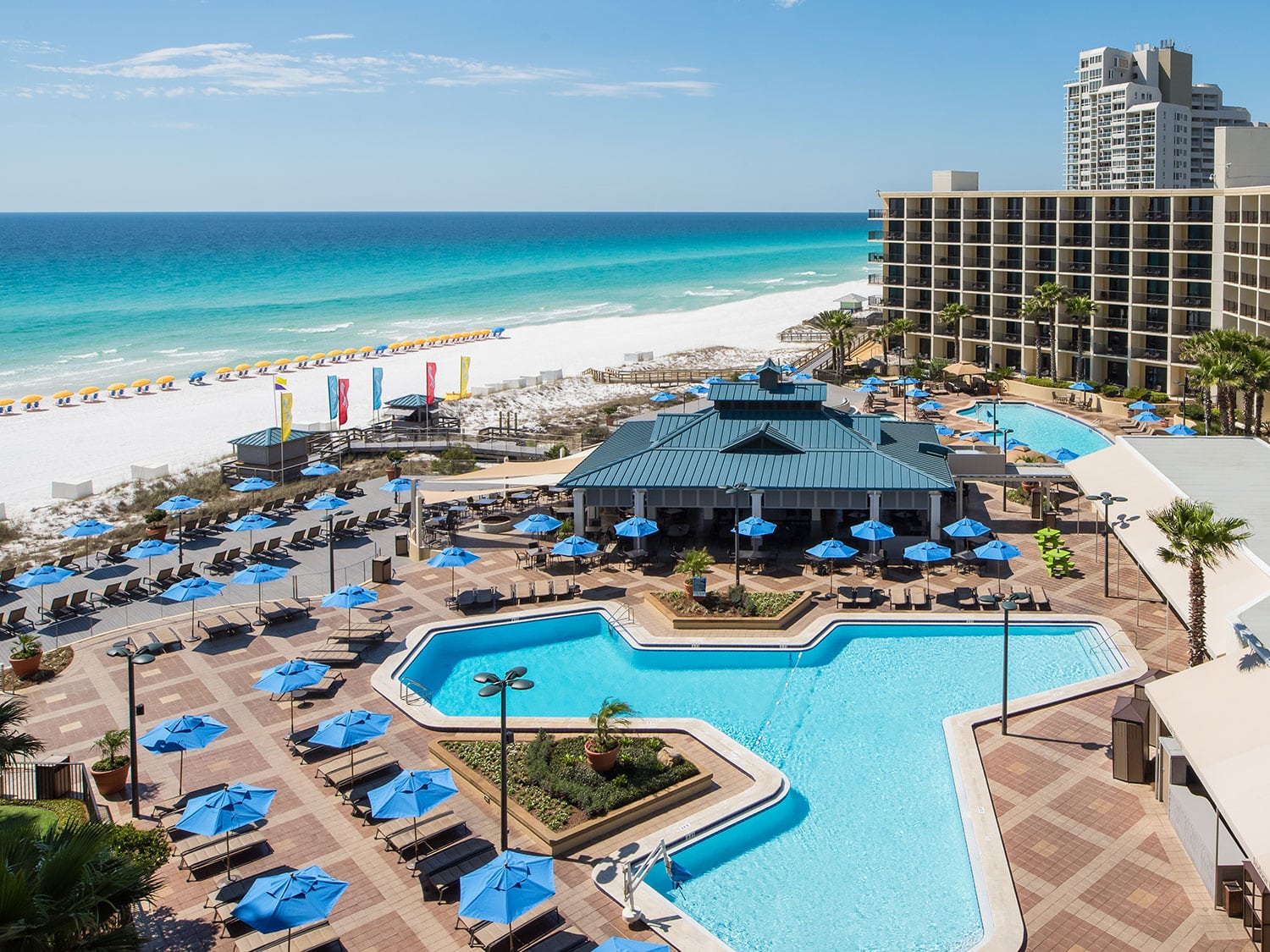 The pool and adjacent beach at the Hilton Sandestin Beach Golf Resort and Spa in Florida.