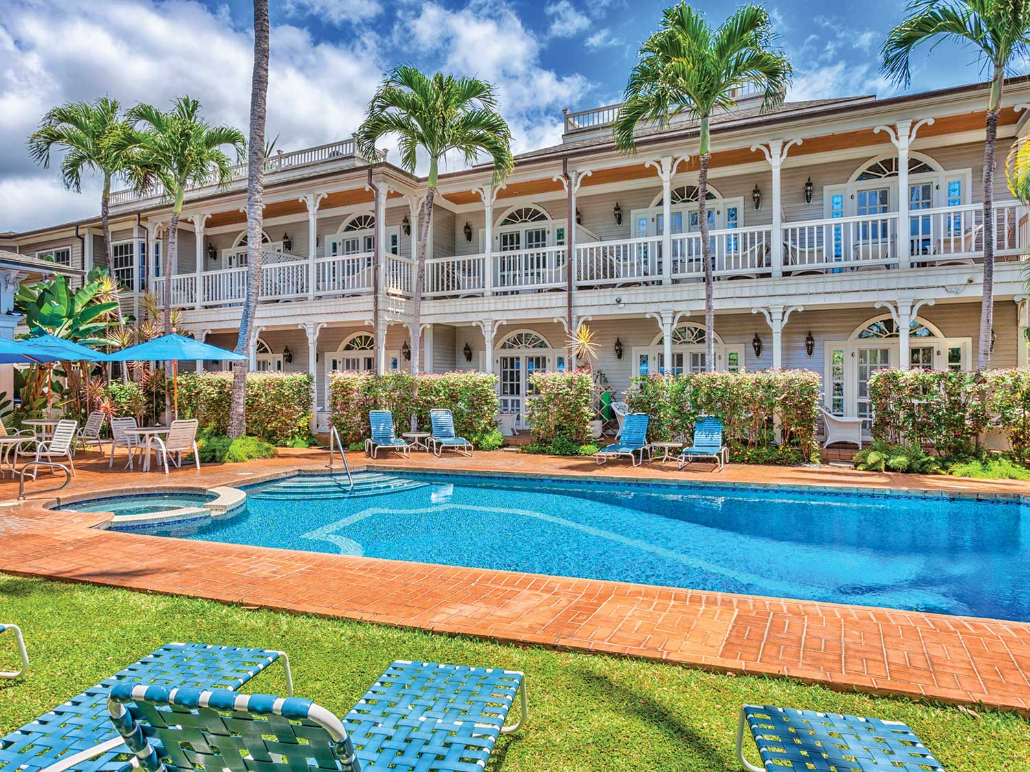 The pool and patio area at The Plantation Inn bed and breakfast in Maui, Hawaii.