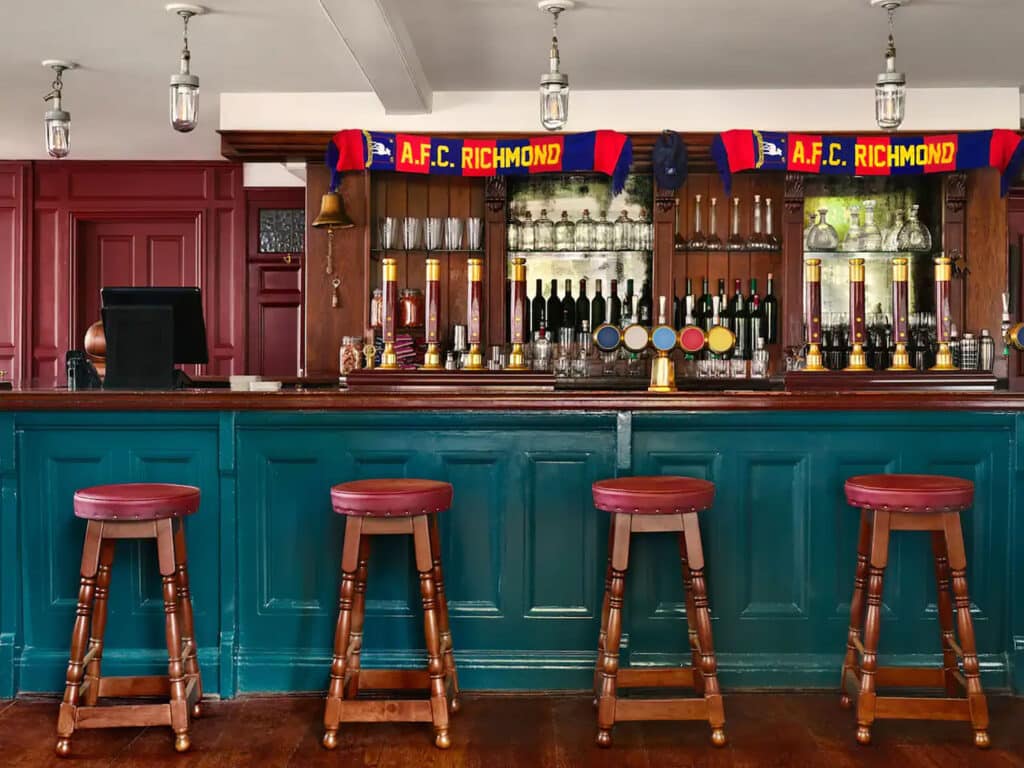 The interior bar shot of The Prince’s Head pub in Richmond, England, where the Crown and Anchor scenes are filmed for Ted Lasso.