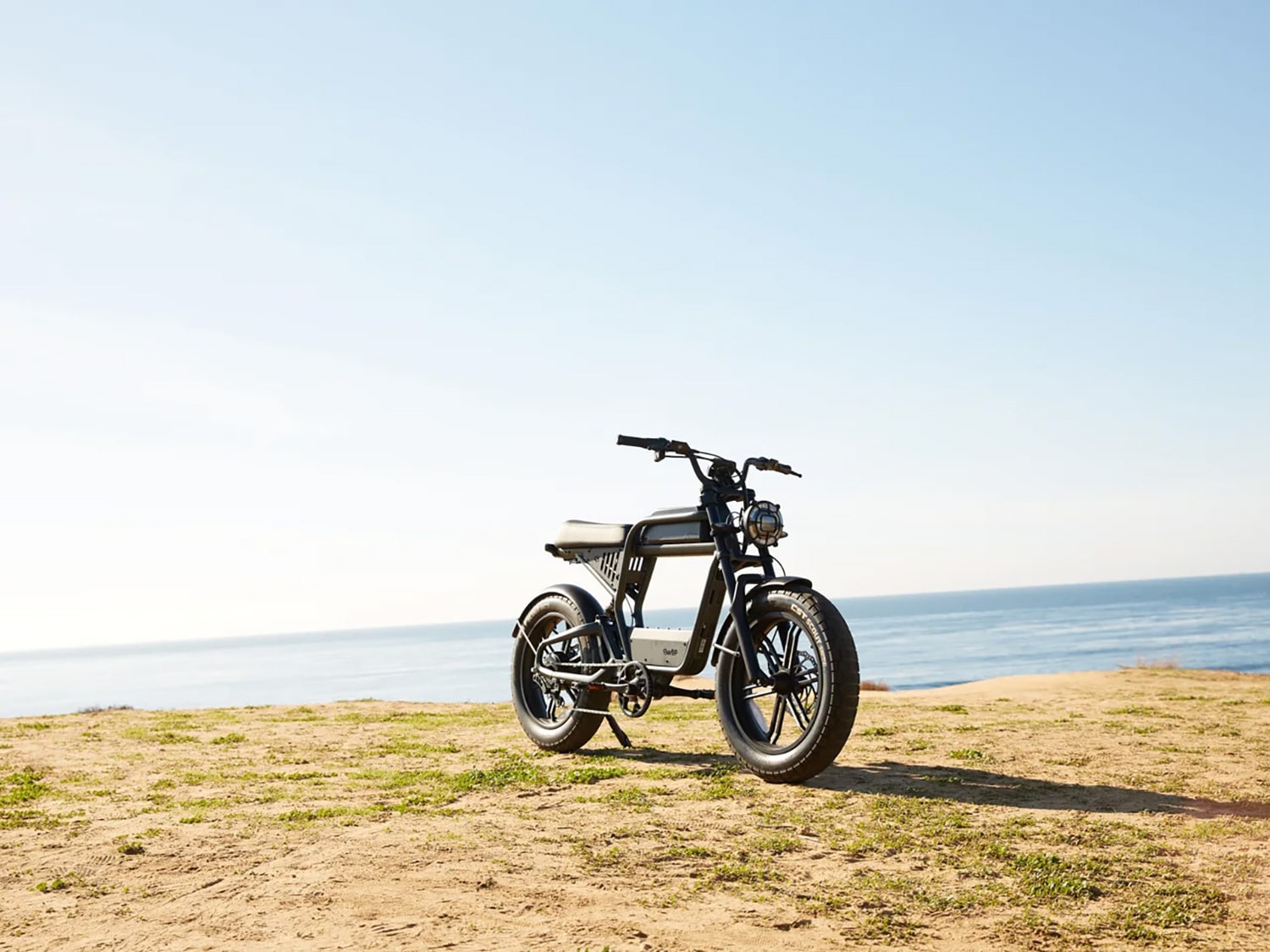 The Revv1 Ride1Up Electric Bike in an oceanside setting.