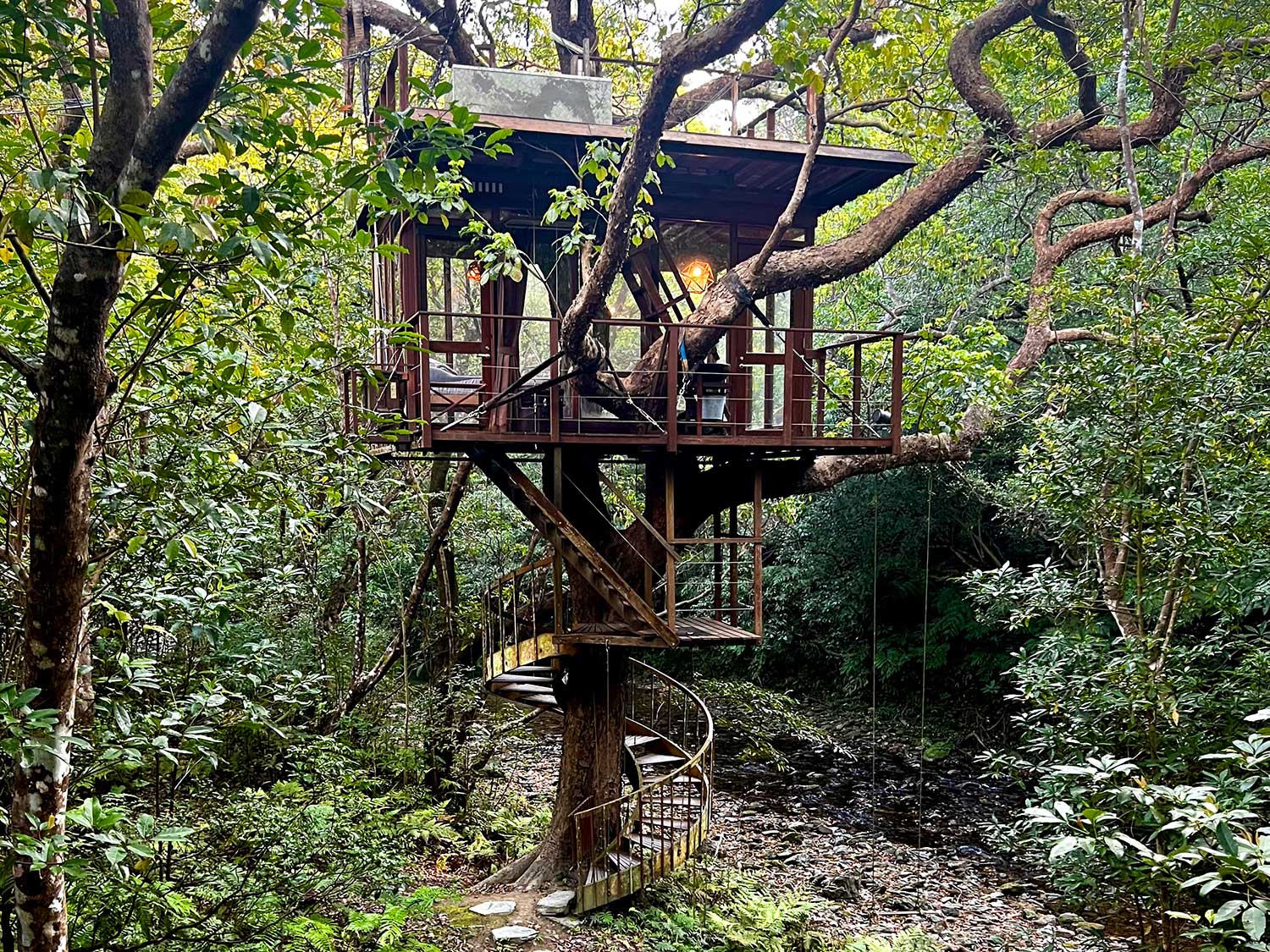 The spiral treehouse is one of four accommodations at the Treeful Treehouse in Okinawa, Japan.