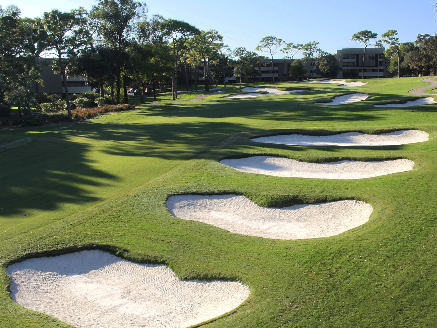 An aerial view of the Copperhead Course's 18th hole sand traps and green at Innisbrook Golf Resort in Palm Harbor, Florida.