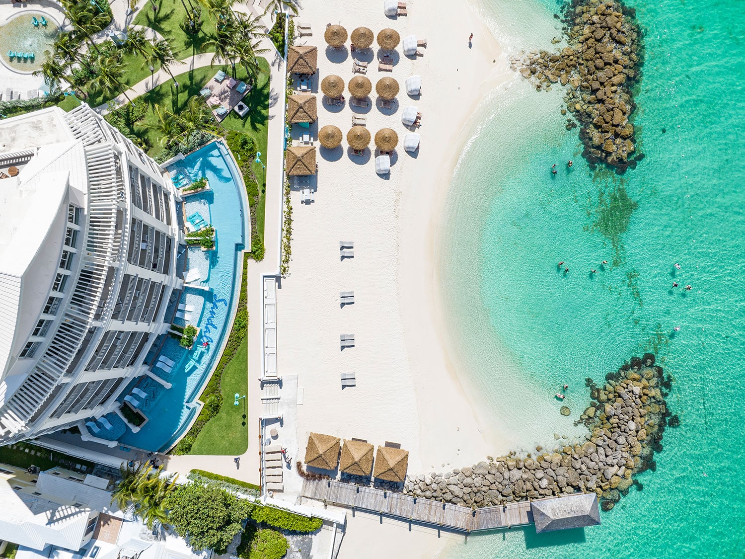 An aerial view of the beach and property at Sandals Royal Bahamian in Nassau, Bahamas.