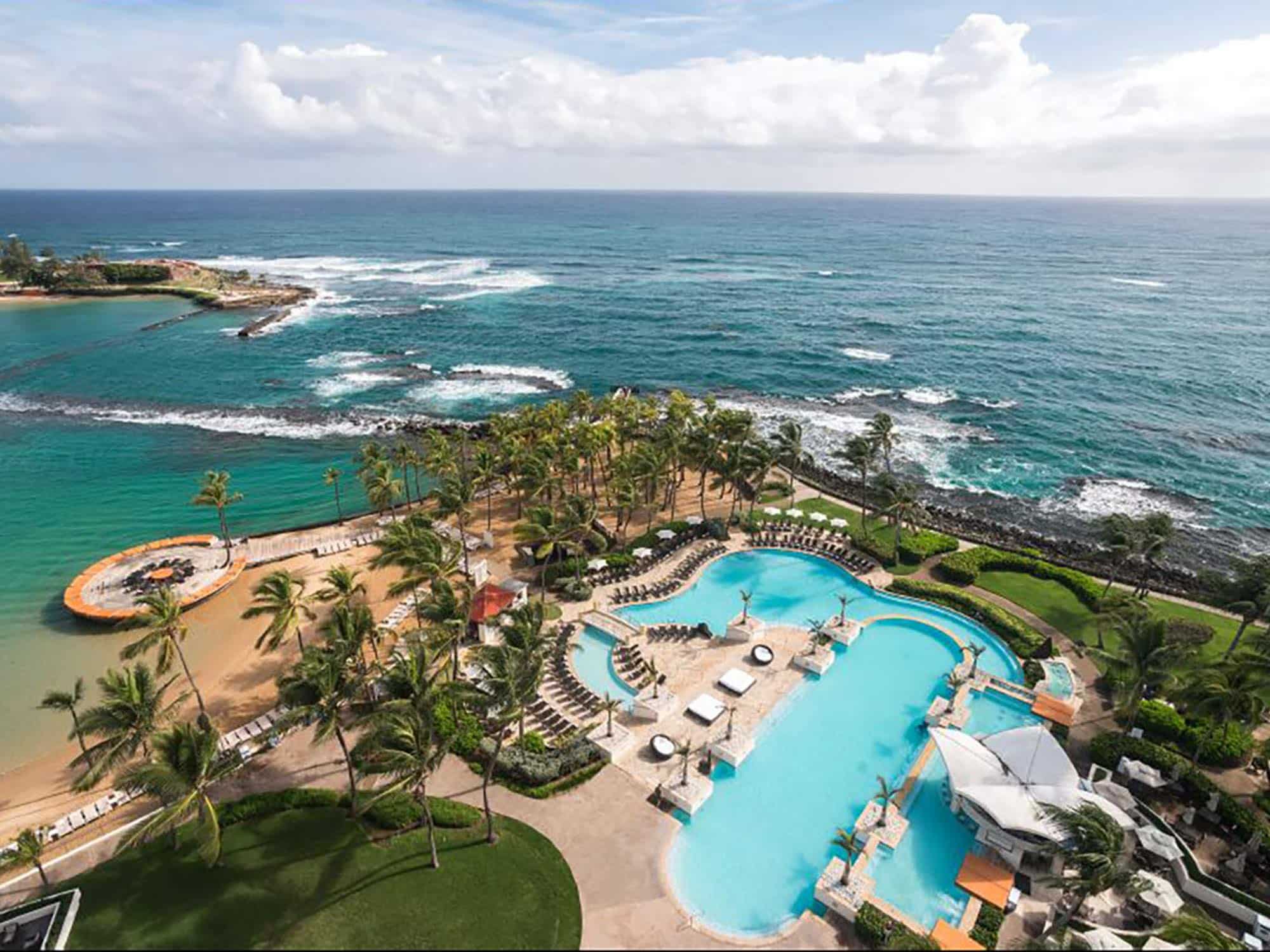 An aerial view of the pool and property at Caribe Hilton in Puerto Rico.