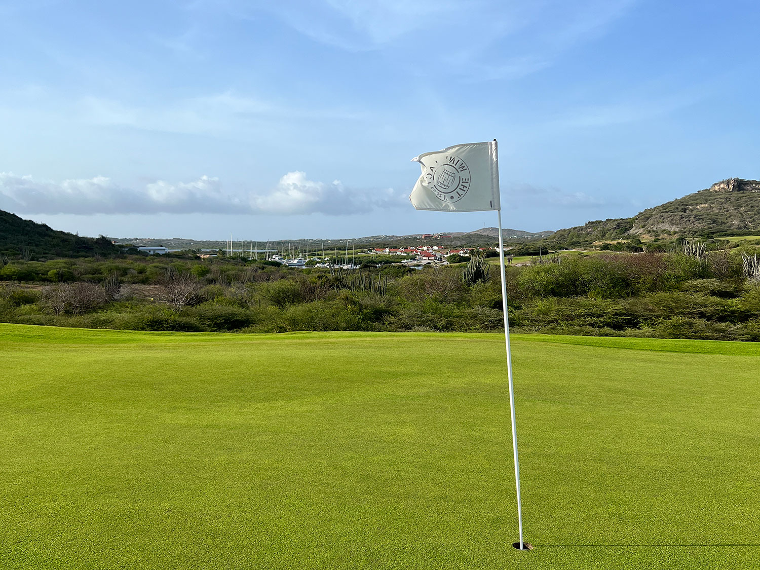 A flag on the green of a hole at the Old Quarry Golf Course on the Dutch Caribbean island of Curaçao.
