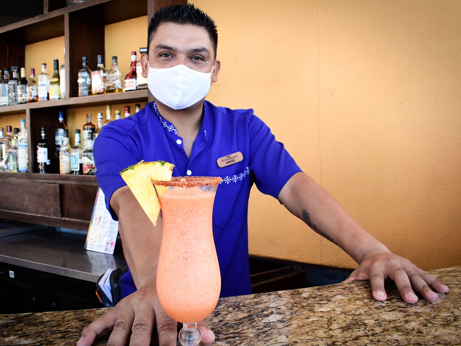 Bartender David serves a Tropical Diamond cocktail at Hacienda Encantada Resort and Residences.