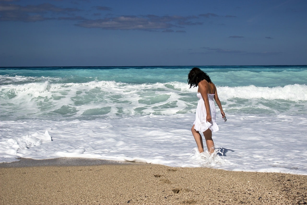 Girl walks on a beach