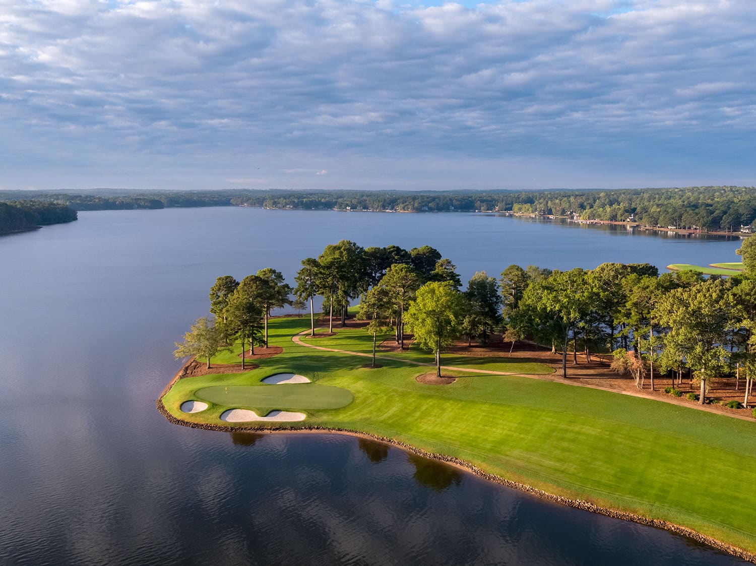 An aerial view of a golf hole at the Great Waters course at Reynolds Lake Oconee in Georgia.