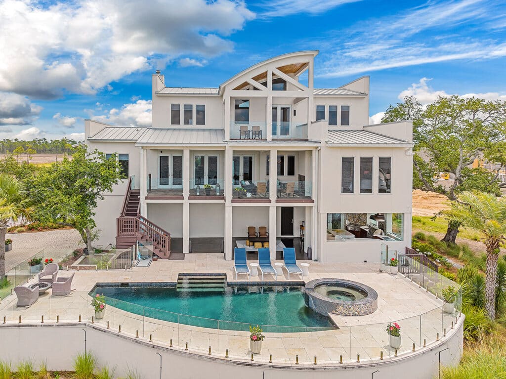 A rear view of a three-story home on North Bay in the Florida panhandle.