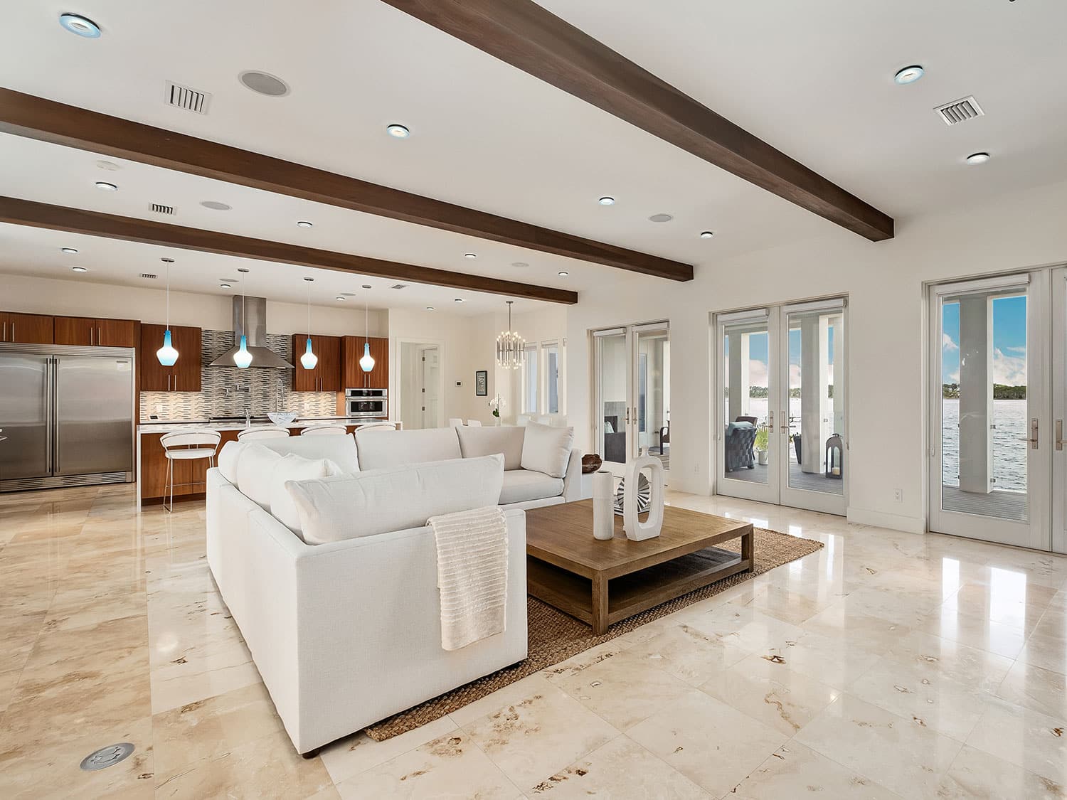 The living space and kitchen of a three-story home on North Bay in the Florida panhandle.