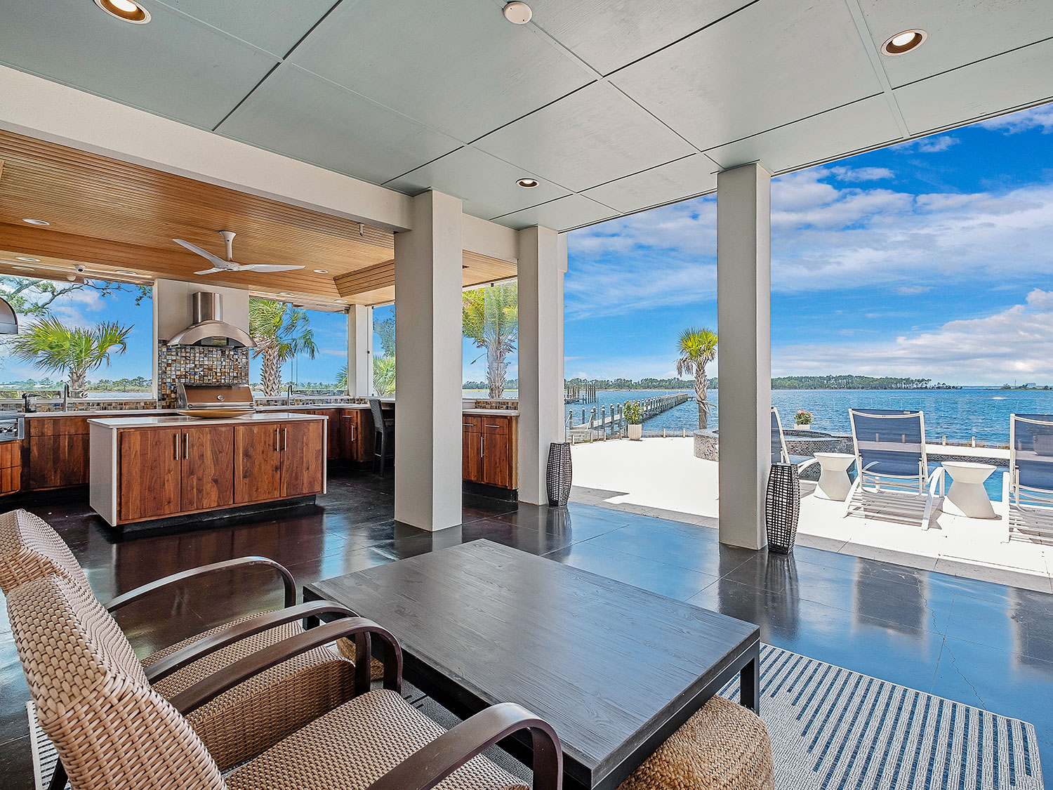 The pool deck of a three-story home on North Bay in the Florida panhandle.