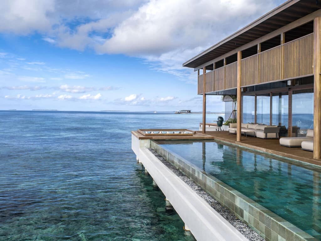The infinity pool of the Overwater Reef Residence at Park Hyatt Maldives Hadahaa.