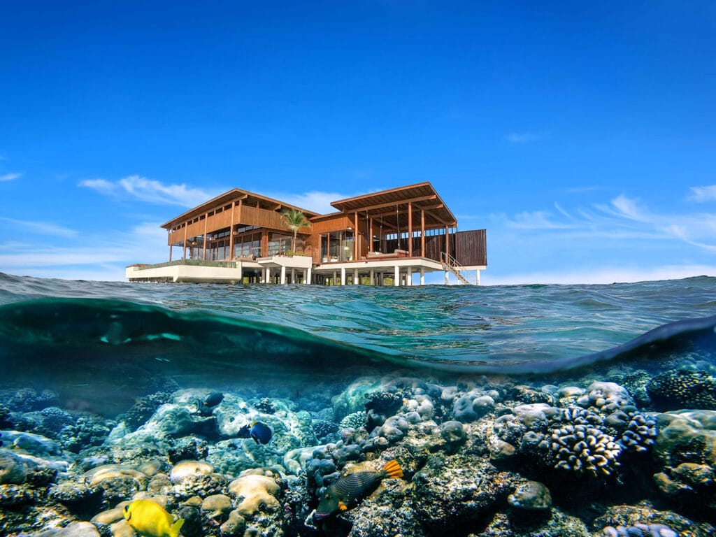 A view of the exterior and house reef at the Overwater Reef Residence at Park Hyatt Maldives Hadahaa.