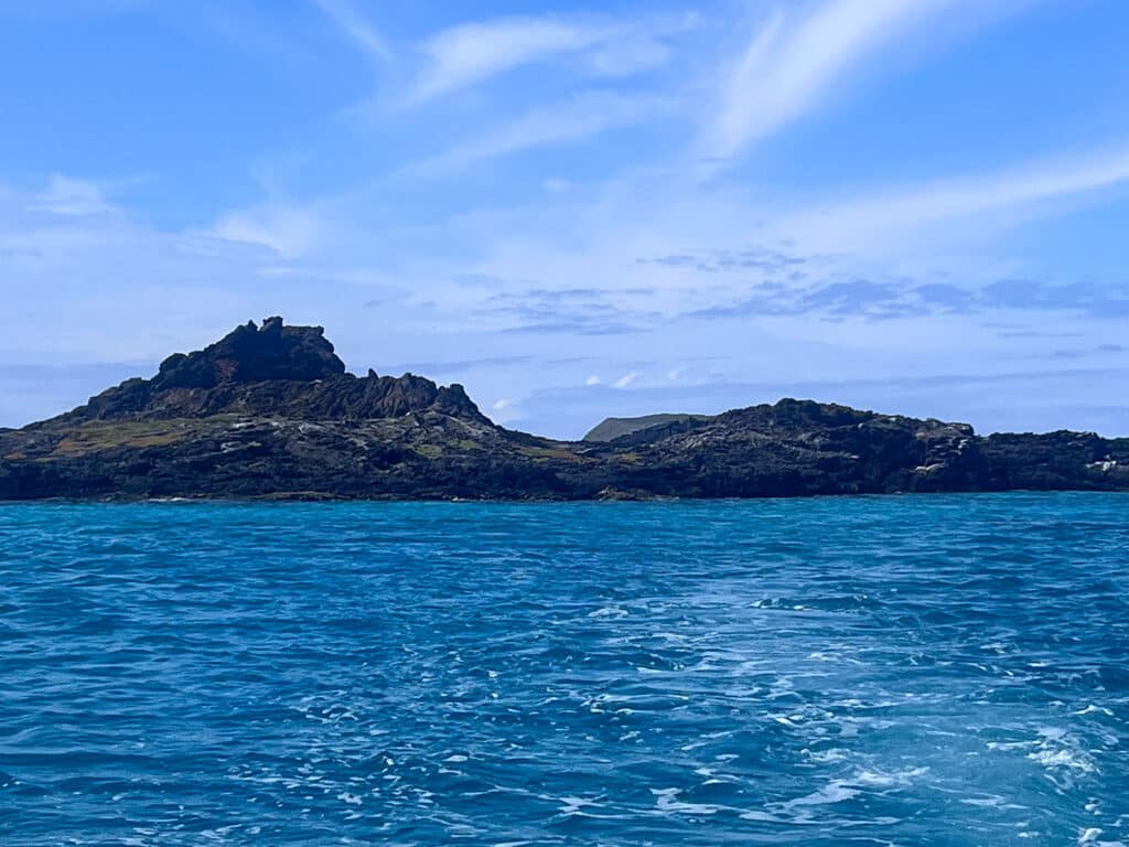 A boater's view of an island in the Galapagos chain