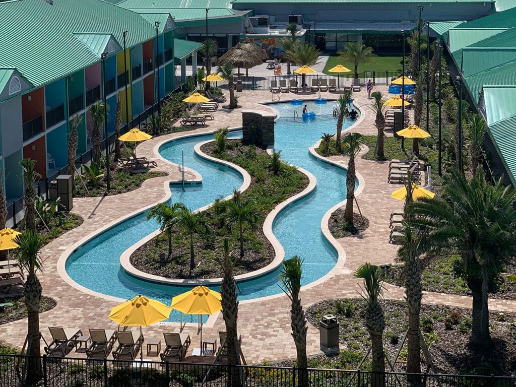 An aerial view of the pool and lazy river at Beachside Suites